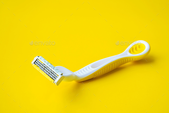 Used disposable razor for safe shaving. Female razor for daily p