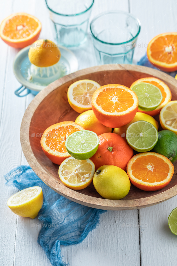 Mix of citrus fruits with oranges, lemons and limes.
