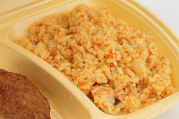 Cutlet and rice in a plastic box for delivery. - Stock Photo - Images
