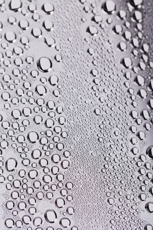 Drops and trickles of water on the glass. - Stock Photo - Images