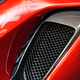 detail of sport car with red metal hood and black air flow intake ornament - PhotoDune Item for Sale
