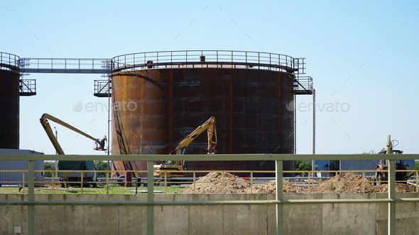 Big industrial oil tanks in a refinery base. industrial plant. industrial oil press tank.