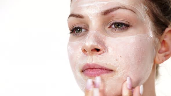 Girl Apply Mask Cream on Face