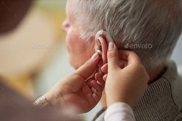 Social worker caring about man with deafness