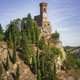 Brisighella clock tower on the cliff. Emilia Romagna, Italy. - PhotoDune Item for Sale