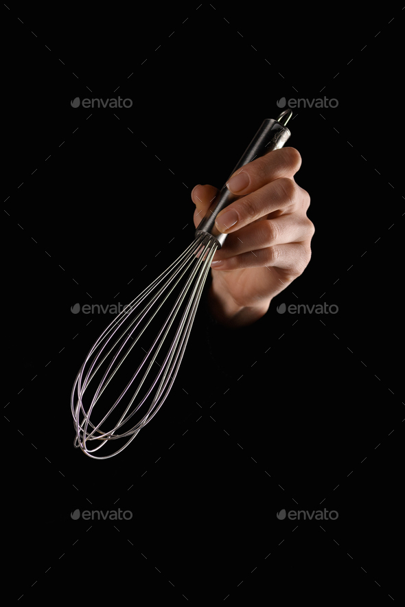 Hand Holding Whisk Photos and Images