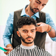 Man at barbershop having haircut - PhotoDune Item for Sale
