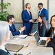 Diverse businesspeople enjoy meeting in conference room - PhotoDune Item for Sale