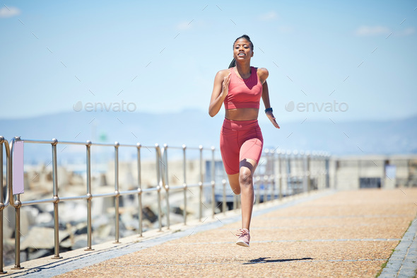 Black woman, running and fitness with run outdoor, athlete with cardio ...