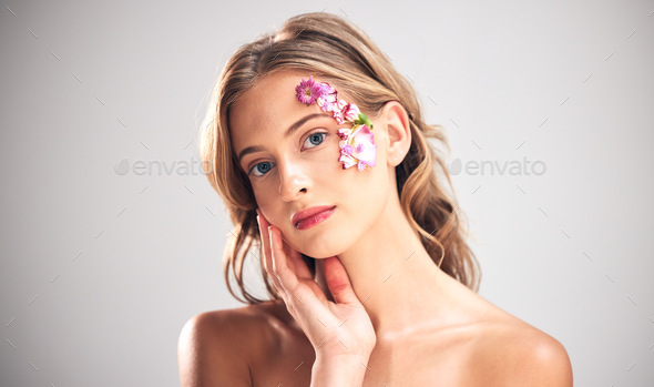Beauty, art and portrait of woman with flowers for natural cosmetics, skincare wellness and makeup