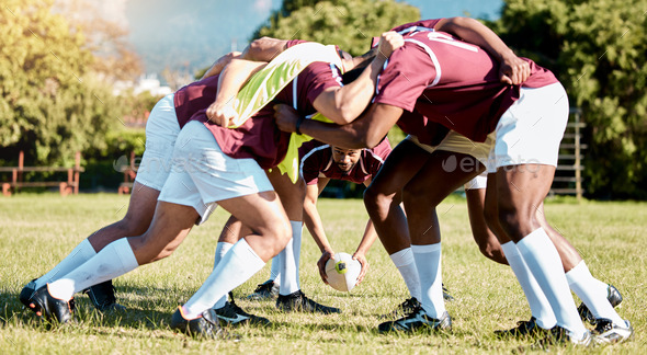 Rugby scrum, sports team and grass field exercise of training sport group outdoor. Teamwork, fitnes