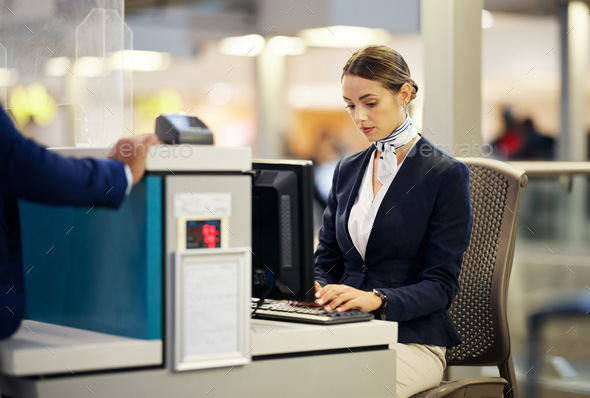 Airport, check in desk and woman typing for security, identity and travel documents for border immi