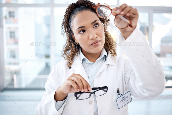 Glasses, vision and black woman eye doctor check lens and frame for healthcare and optometry. Medic