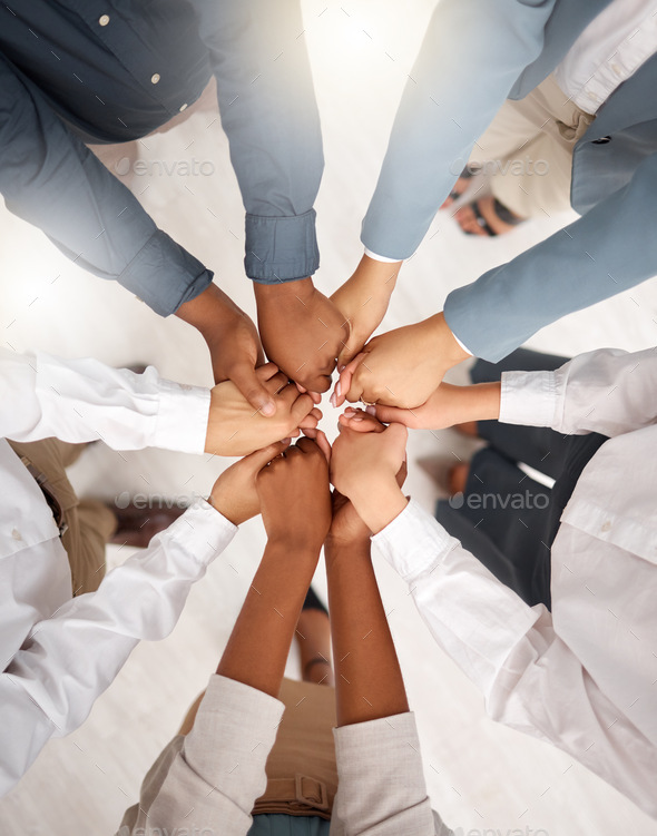 Teamwork, diversity and group holding hands in circle for support, trust and team building together