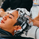 Barber washing head client in barbershop - PhotoDune Item for Sale