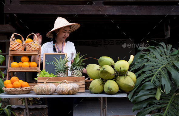 Asia woman selling fruits at the farm stay, Homestay at Thailand Loei