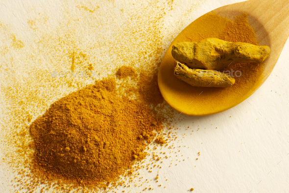 Turmeric stick and powder. Complementary medicine