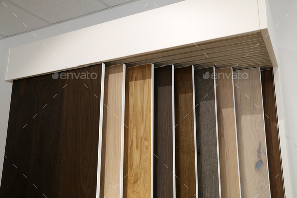 Closeup of a display of samples of laminated floor texture pattern