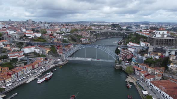 Aerial View Of Dom Luis I Bridge Between The City of Porto And Vila Nova de Gaia Over Douro River In alt