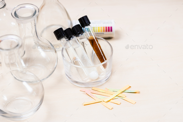 test tubes with solutions, flasks and indicators
