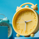 Time for a change: Vintage alarm clock signals the arrival of spring with a clear message to spring  - PhotoDune Item for Sale