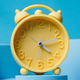 Spring into action: Vintage alarm clock inspires us to take action and make the most of the longer d - PhotoDune Item for Sale