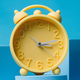Time for a fresh start: Vintage alarm clock celebrates the arrival of spring with a message to sprin - PhotoDune Item for Sale