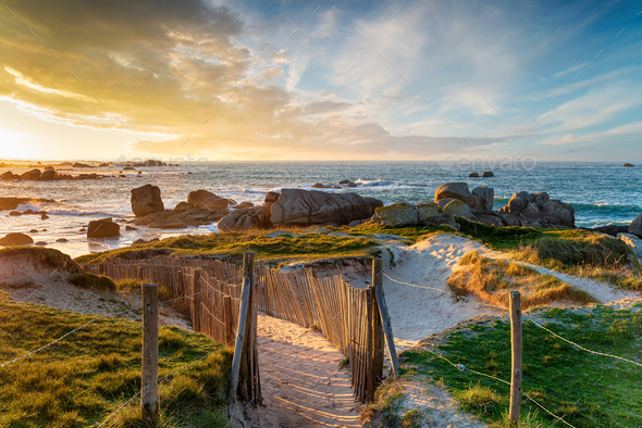 Beautiful sunset over the beach at Meneham - Stock Photo - Images