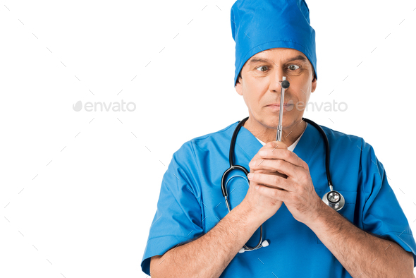 Doctor in uniform looking at reflex hammer isolated on white