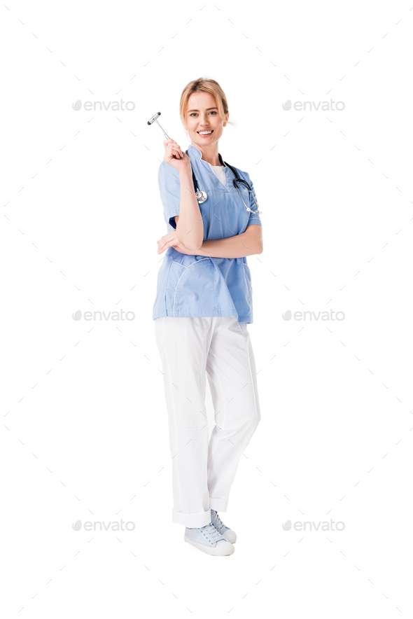 Smiling young nurse in uniform with reflex hammer isolated on white