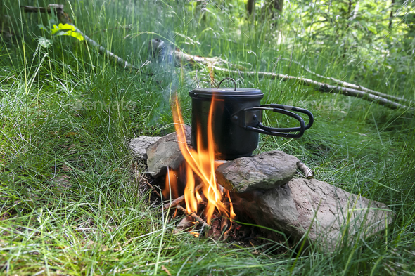campsite cooking on fire
