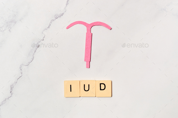 IUD, contraceptive method concept and sex education.