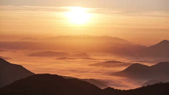 Sunrise over the misty mountain landscape  FHD alt