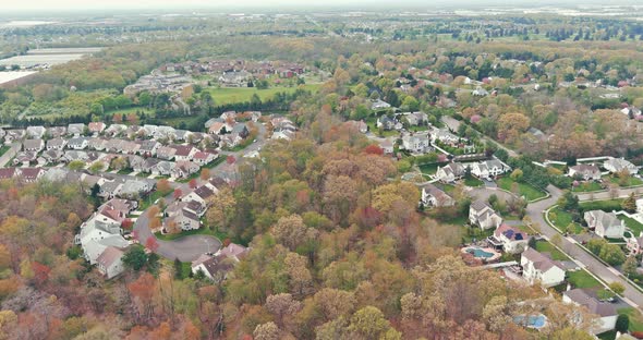 Aerial View of Drone Flying in Small Settlement in the Suburban alt