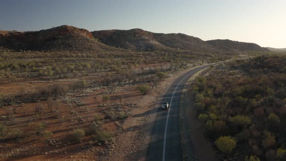 Aerial view of x travelling in the outback. alt