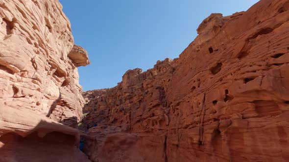 Beautiful colored Dahab canyon in Egypt on a bright sunny day. alt