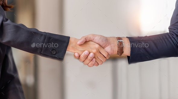 Business man offer and give hand for handshake in office. Successful job interview. Apply for loan