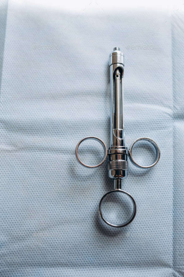 wisdom tooth removal syringe for the dentist Stock Photo by fentonroma