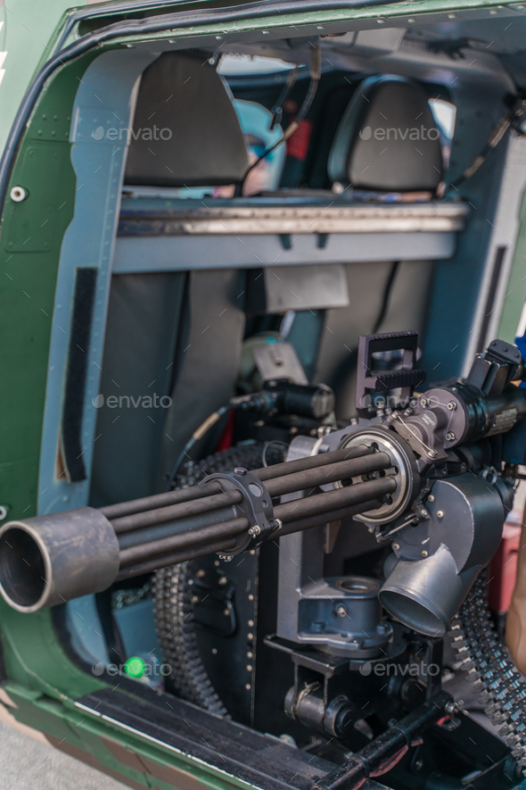 Closeup of a powerful rapid fire heavy machine gun with ammunition
