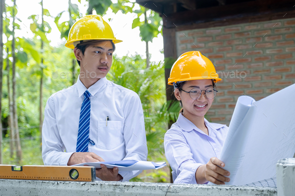 Engineer contractor team meeting work safety plan industry project and check design