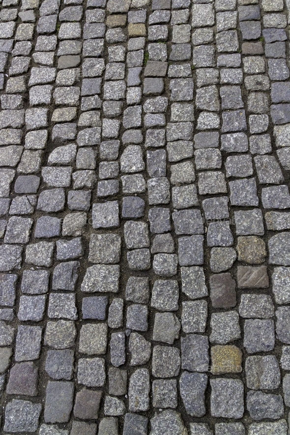 Closeup of a cobblestone road under the sunlight - a nice picture for ...