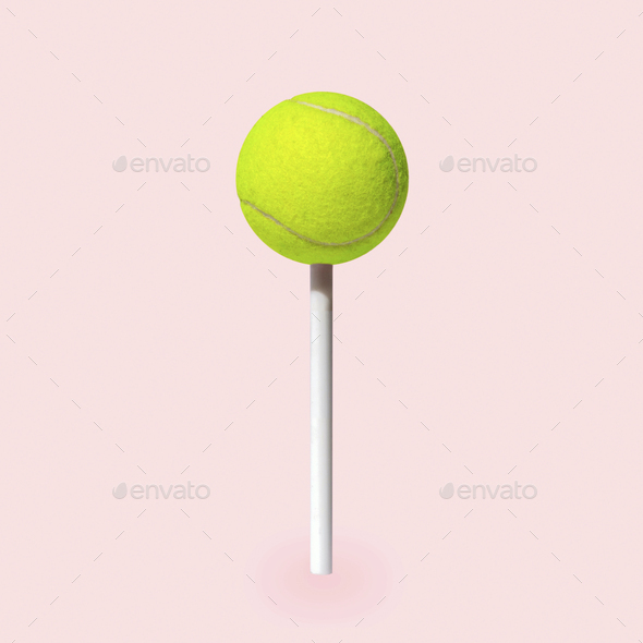 Minimal fun pop art tennis ball like candy on a stick. Minimal fun poster about sports and dessert. - Stock Photo - Images