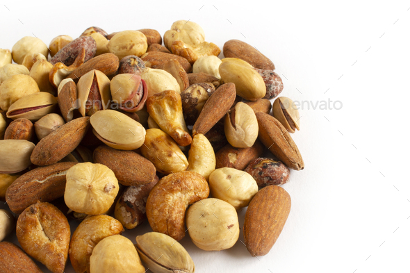 Mixed nuts. Edible, raw, organic and vegan. Stock Photo by safakc1