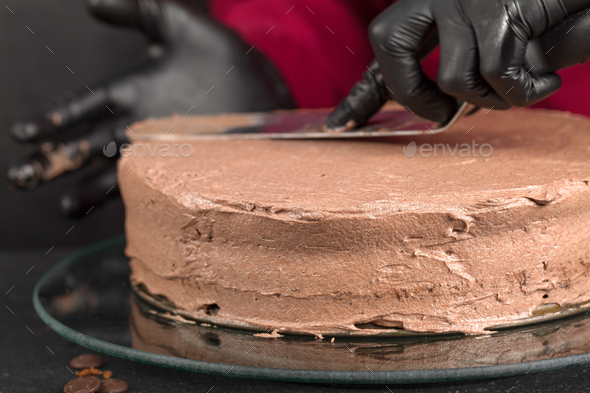 Cake decoration. Cocoa mousse. Chocolate cake - Stock Photo - Images