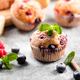 Freshly baked muffins with powdered sugar and fresh berries - PhotoDune Item for Sale