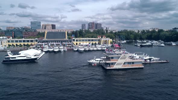 Aerial View of Yacht Club on the River Against the Background of the City