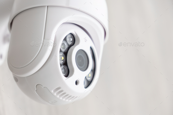 Security CCTV camera in office or shop building for protection against thieves.