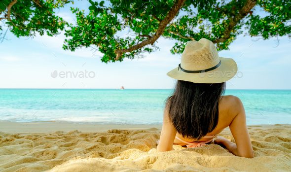 Young fashion woman relax on the beach.Summer vacation holiday.hot