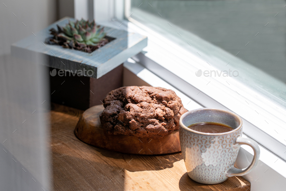 coffee and cookies near the window - Stock Photo - Images