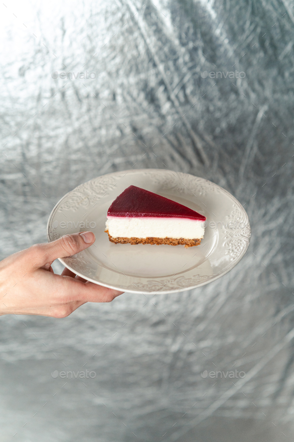 Plate with slice of cheesecake. Homemade baking - Stock Photo - Images